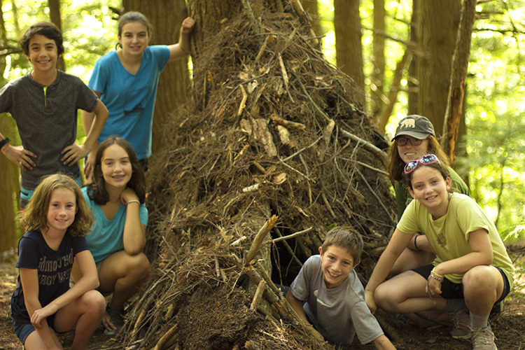 Wildwood campers showing off a "gnome home" they build in the forest