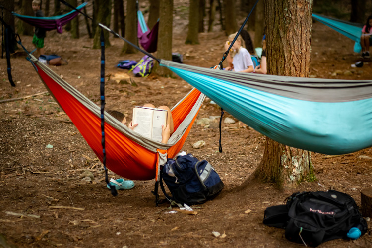 Reading a book in a hammock in the Chill Zone