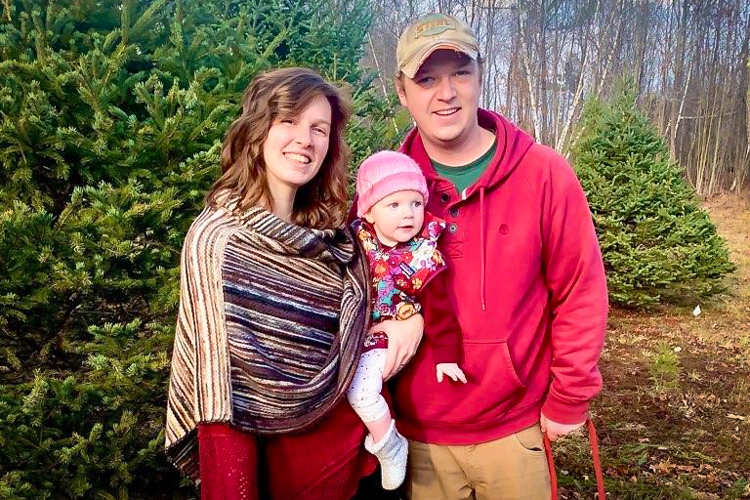 Wildwood Caretakers Stephanie and Collin Tourgee with their daughter, Eva