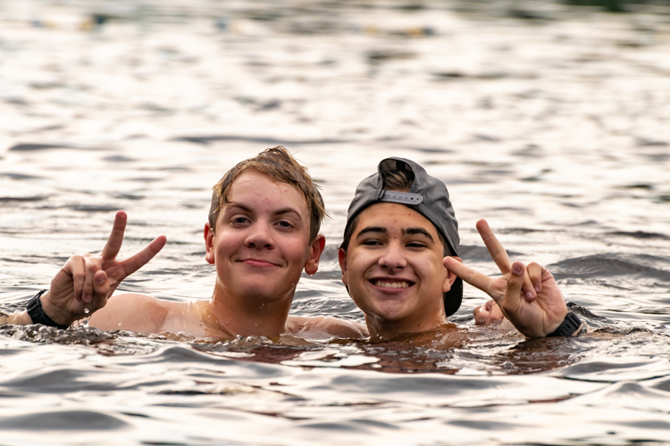 Wildwood 2021 Session 2 Campers swimming and posing for the camera