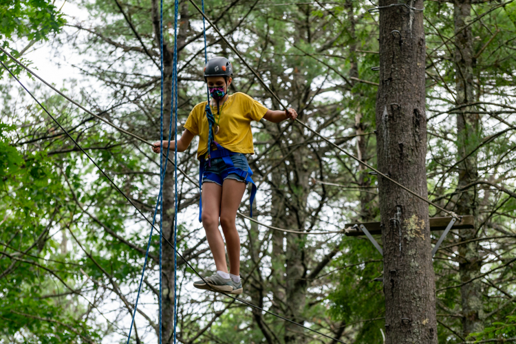 Taking on the Burma Bridge at the Ropes Course