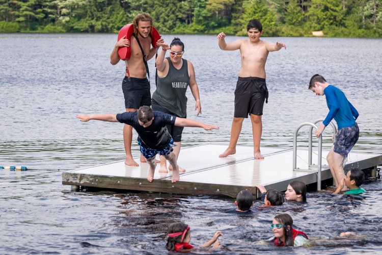 The surprise hit of the session: Rock-Paper-Scissors on the raft! Loser has to jump in the water!