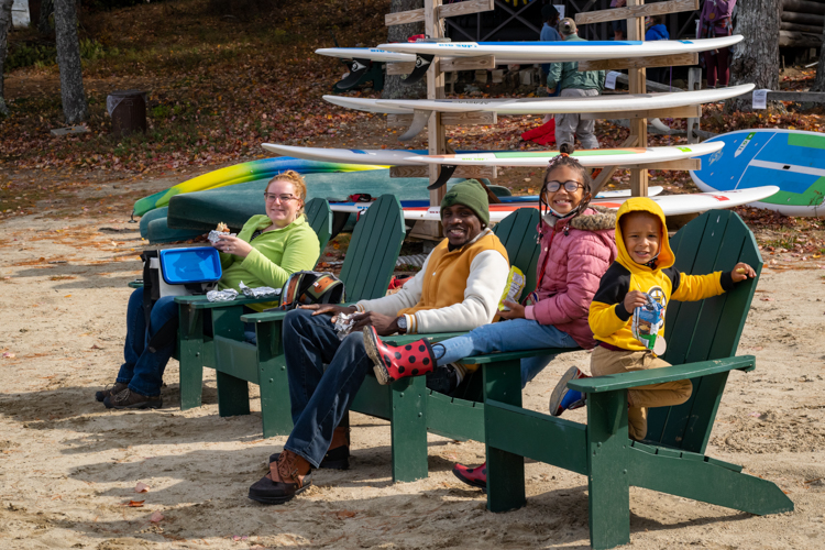 Enjoying lunch on the beach at Hubbard Pond