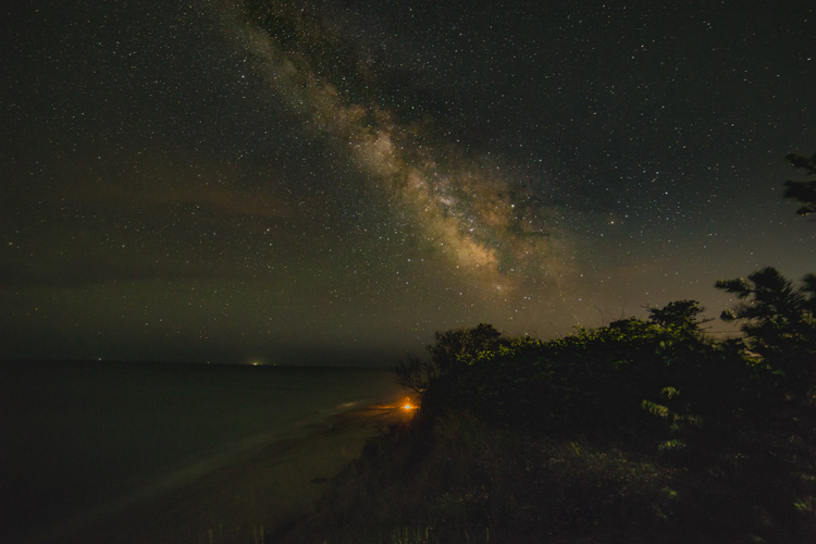 Night sky over a beach