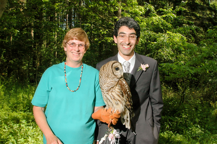 Flavio (right) on his wedding day with his mentor, Bet Ross, and his ring bearer owl, Grinnell