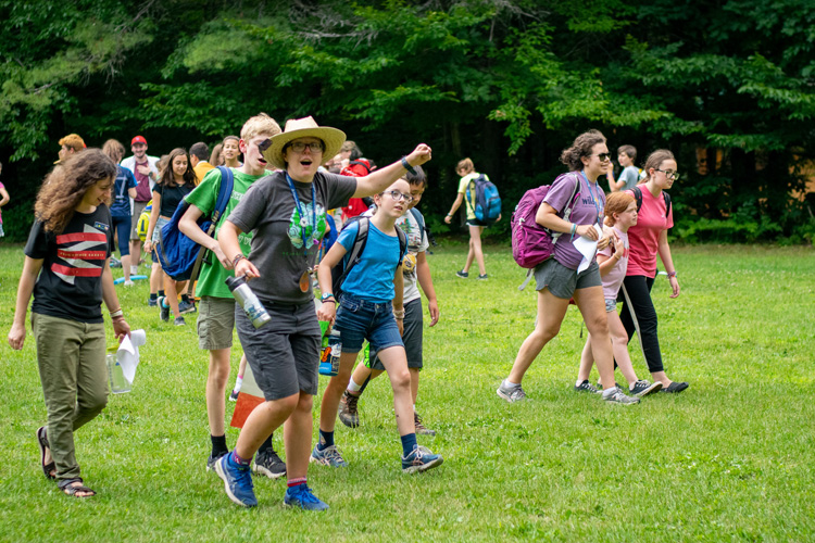 Nina Swett leading a group of campers during a Camp Olympics activity