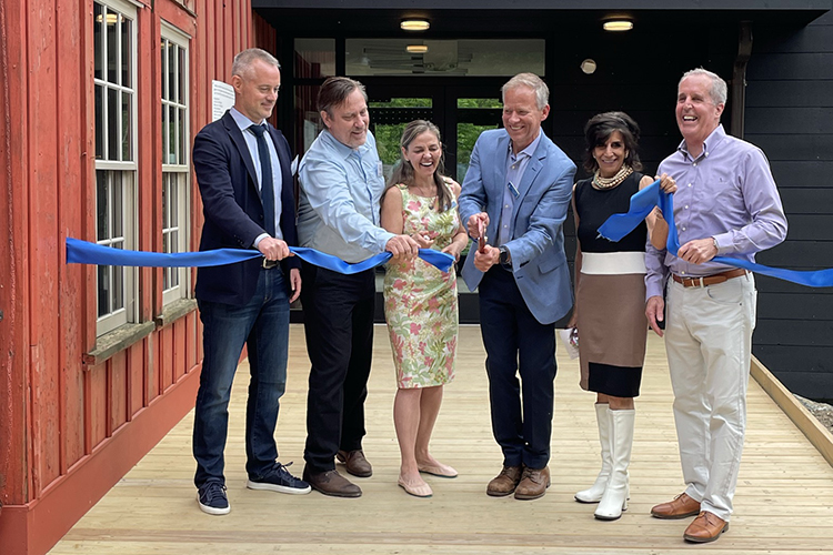 Matthew Keator of Mass Cultural Council, Lenox Select Board Chair Neal Maxymillian, West Director Becky Cushing Gop, David O'Neill, Allyce Najimy of Mass Cultural Council, and State Rep. William “Smitty’ Pignatelli cutting the ribbon